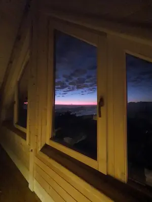 a window in a house with a view of the sky at Villa Skyline in Kotor
