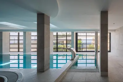 a view of a swimming pool in a building at CONTiNUUM in Ulcinj