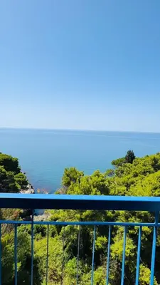 a view of the ocean from a balcony at CORPUS A - Hotel Albatros in Ulcinj