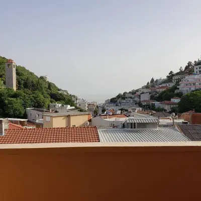 a view of a town from the roof of a building at City Center Two-Bedroom Apartment in Ulcinj