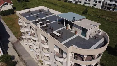 an aerial view of a building with a patio at Guesthouse Liamra in Ulcinj