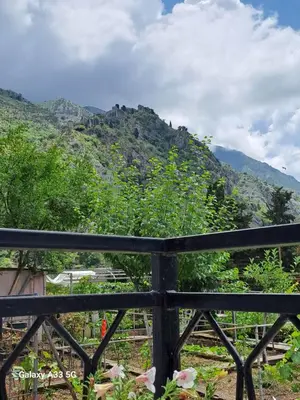 a view of a mountain from a fence at Apartment Marina 2 in Kotor