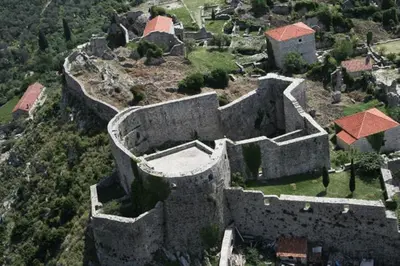 an old building on top of a mountain at Rooms & Apartments Anka in Bar