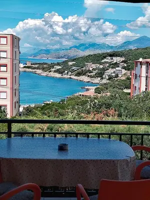 a view of a body of water from a balcony at Apartmani LJUBICA in Utjeha