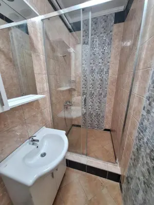 a bathroom with a sink and a shower at Montesan Luxury Apartment Beach Front in Sveti Stefan