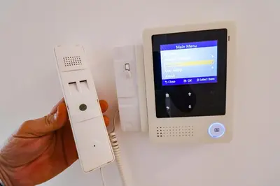 a person holding a wii remote in front of a computer at Flat Rafailovic One minute to Beach in Budva