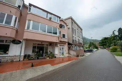 an empty street in a town with buildings at Studio Apartment Silva in Kotor