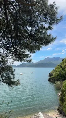 a view of a lake with boats in the water at Skadar Lake Apartment -Karolina in Vranjina
