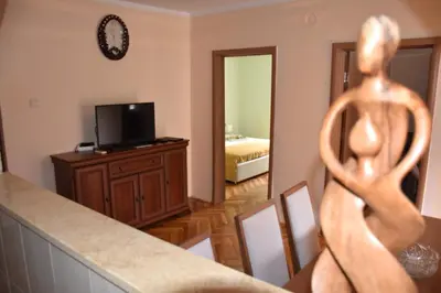a view of a living room with a television at Apartment City View in Kotor