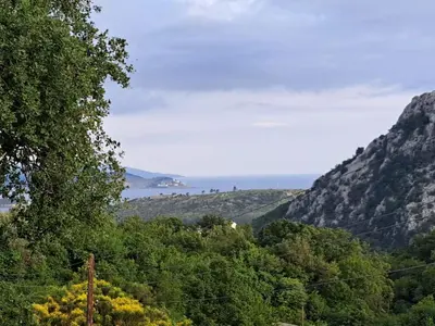 a view of a valley with trees and mountains at Once Upon a Time in Montenegro in Sutomore