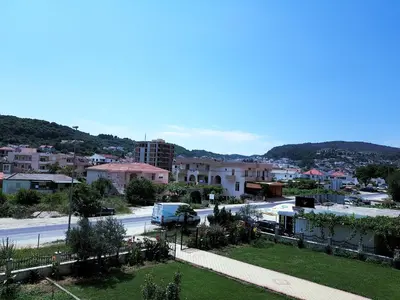 a view of a city with a street and buildings at Apartments Ela in Ulcinj