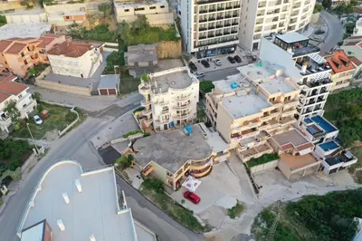 an aerial view of a city with buildings at Apartments Delfin in Ulcinj