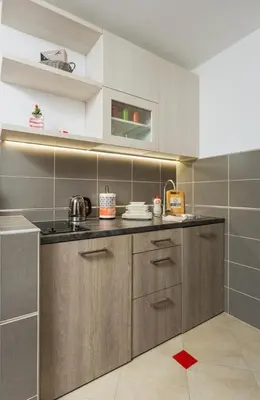 a kitchen with a sink and a counter top at Adzic Apartments in Budva