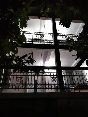 a building with light coming through the windows at ApartToni in Dobra Voda