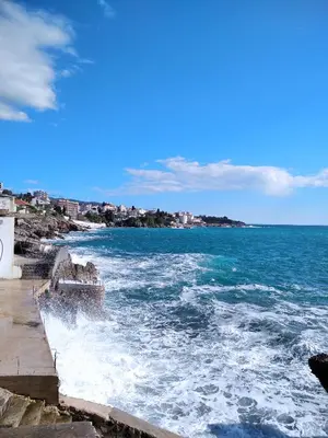 a view of the ocean with waves crashing at ApartToni in Dobra Voda