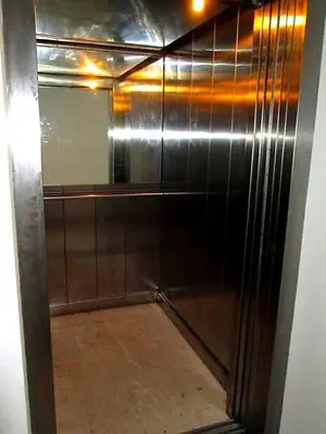 a glass door of a shower in a room at Studio center Budva in Budva