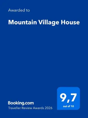 a screenshot of a mountain village house with the text upgraded to mountain village house at Mountain Village House in Cetinje
