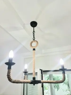a chandelier hanging from a ceiling at Apartman GD in Budva
