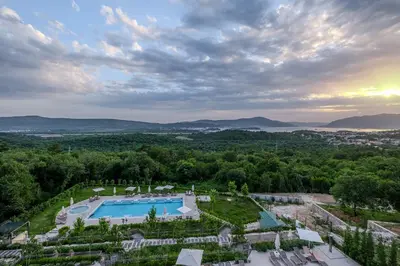 an aerial view of a resort with a swimming pool at Montenegro Lodge in Tivat