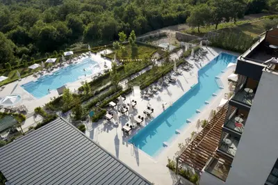 an aerial view of a pool at a resort at Montenegro Lodge in Tivat