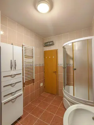 a bathroom with a toilet and a shower and a sink at The rising sun-Stylish Sea View Apartment in Budva