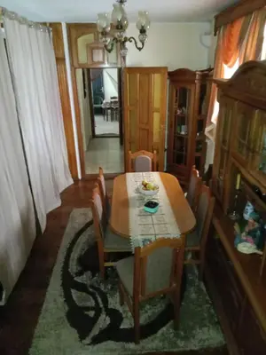 a dining room with a table and chairs at Centar Starog Grada in Kotor