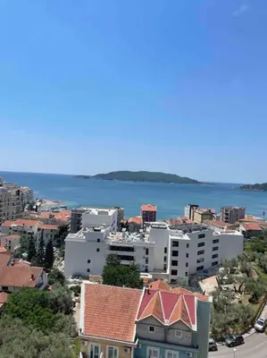 an aerial view of a city with a body of water at Golden Details Apartment in Rafailovici