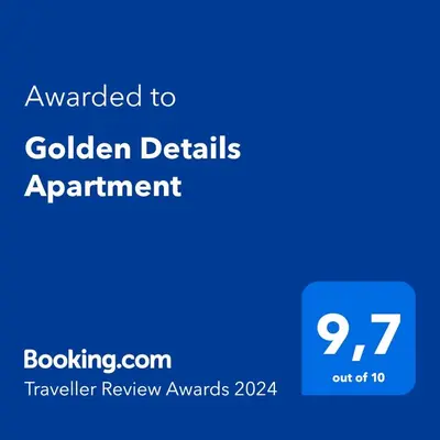 a blue screen with the text awarded to golden details appointment at Golden Details Apartment in Rafailovici