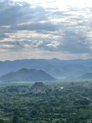 a view of a valley with mountains in the distance at Honey Home in Podgorica