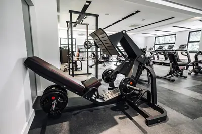a gym with several treadmills and machines at Status-M Apartments 112 in Becici