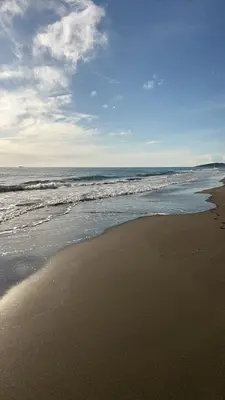 a beach with the ocean on a cloudy day at Babulje in Ulcinj