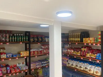 a store aisle filled with lots of food and drinks at Apartments Zuto in Ulcinj