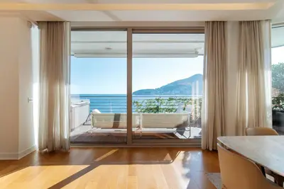 a living room with a view of the ocean at Luxury Waterfront Villa at Dukly Gardens in Budva