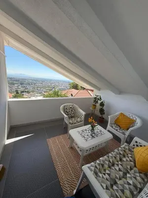 a balcony with a table and chairs and a view at Perfect VIEW in Ulcinj