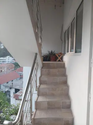 a staircase leading up to the top of a building at Boggi Apartments in Ulcinj
