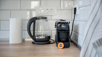 a blender sitting on a counter in a kitchen at Cozy apartment, 10 minutes walking distance from the Old Town in Kotor