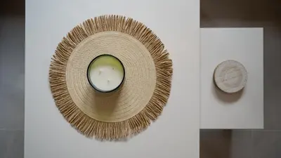 a bowl with a candle in it on a wall at Cozy apartment, 10 minutes walking distance from the Old Town in Kotor