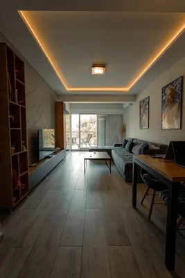 a living room with a couch and a table at eagles nest in Budva