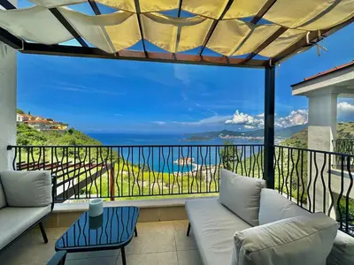 a balcony with a view of the ocean at Feel the Spirit Apartment in Budva