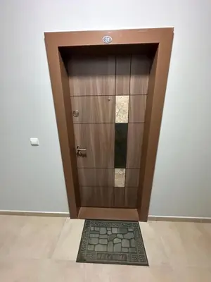 a door with a mat in front of it at Apollo 1 in Ulcinj