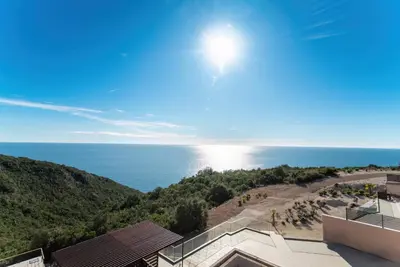 a view of the ocean from a house at Villa Cape Montenegro on Cliffside in Kotor