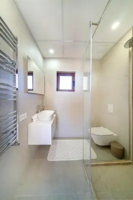 a bathroom with a sink and a toilet and a shower at Villa Cape Montenegro on Cliffside in Kotor