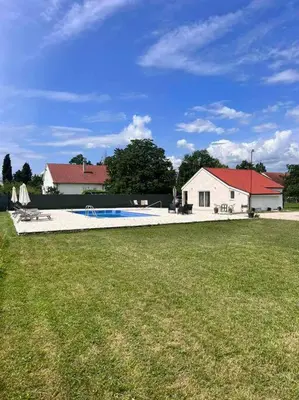 a large yard with a house and a swimming pool at Pool & River House - Lazara in Danilovgrad
