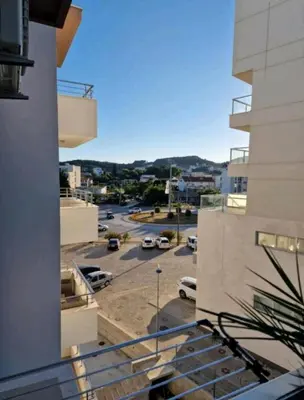 a view of a parking lot from a building at The sun is happiness in Ulcinj