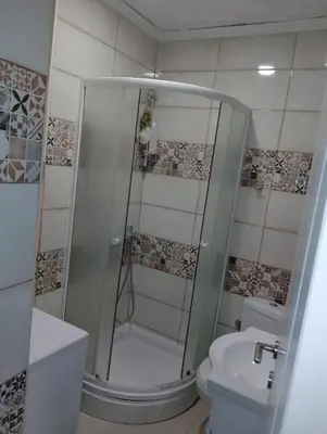 a bathroom with a shower and a toilet at Apartman Jovanovic in Sutomore