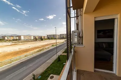 a balcony with a view of a road at Apart Kraft in Podgorica