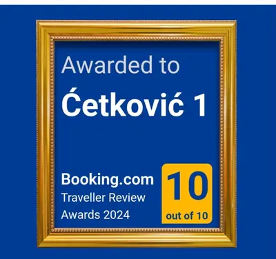 a framed sign with the text awarded to cetky at Ćetković 1 in Petrovac na Moru