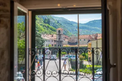 a view of a city from a window at Old Town View - Sunny, Bright & Quiet in Kotor