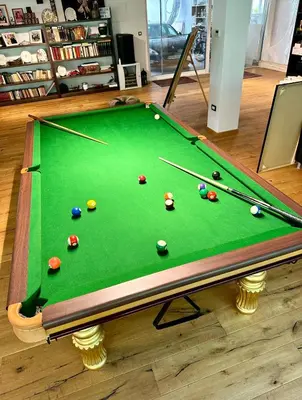 a pool table with balls on top of it at Home Filip in Golubovci