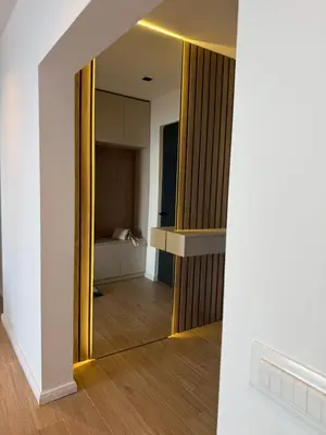 a hallway with a mirror in a room at Sunny&calmhouse in Bar